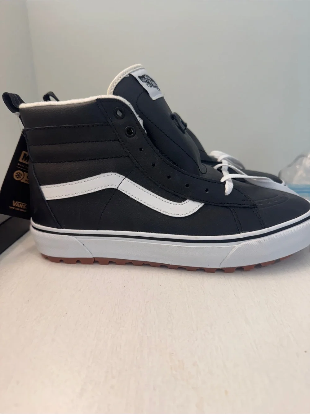 Vans women's 11/men's9.5 Black and White leather High-Top Sneakers